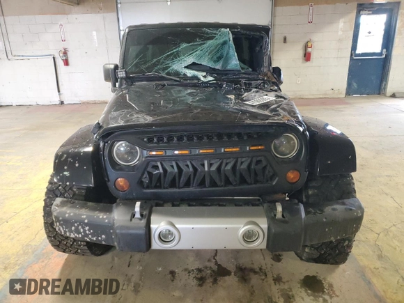 2008 Jeep Wrangler Unlimited Sahara with VIN 1J8GA59118L652519, listed as a Copart auction lot 47089285 with 144,682 mi miles and Non Repairable. Bid and sale history available at carsss.com. Image 5.