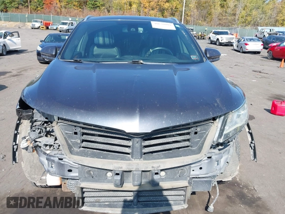 2015 Lincoln MKC with VIN 5LMCJ2A93FUJ24373, listed as a IAAI auction lot 40638009 with 127,336 mi miles. Bid and sale history available at carsss.com. Image 12.