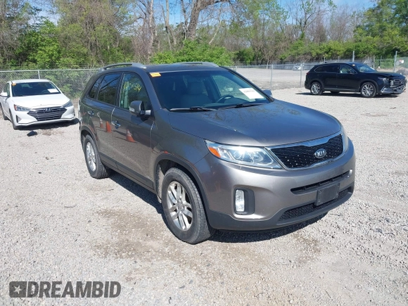 2015 Kia Sorento LX with VIN 5XYKTCA63FG654739, listed as a IAAI auction lot 42081544 with 121,024 mi miles. Bid and sale history available at carsss.com. Image 1.