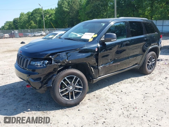 2017 Jeep Grand Cherokee Trailhawk with VIN 1C4RJFLG4HC940652, listed as a IAAI auction lot 42135489 with 102,593 mi miles and . Bid and sale history available at DreamBid. Image 2.