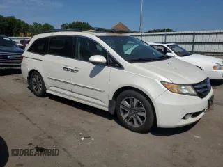 2014 Honda Odyssey Touring with VIN 5FNRL5H93EB041813, listed as a Copart auction lot 63920265 with 153,405 mi miles and Clean title. Bid and sale history available at DreamBid. Image 4.