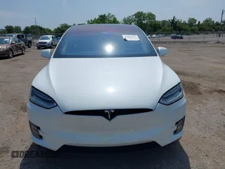 2016 Tesla Model X 70D z VIN 5YJXCBE25GF029372, wystawiony jako IAAI lot #42325335 z przebiegiem 80 071 mil mil oraz . Historia ofert i sprzedaży dostępna na DreamBid. Obrazek 12.