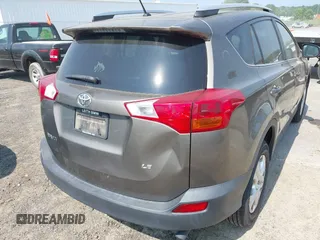 2014 Toyota RAV4 LE with VIN JTMZFREVXED034316, listed as a IAAI auction lot 42610135 with 214,871 mi miles and . Bid and sale history available at DreamBid. Image 21.