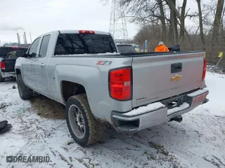 2015 Chevrolet Silverado 1500 LT with VIN 1GCVKREC0FZ252519, listed as a IAAI auction lot 41617697 with 97,737 mi miles. Bid and sale history available at carsss.com. Image 3.
