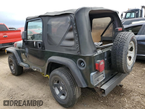 1998 Jeep Wrangler SE with VIN 1J4FY29P9WP767516, listed as a Copart auction lot 58149245 with 190,964 mi miles and Salvage title. Bid and sale history available at DreamBid. Image 2.