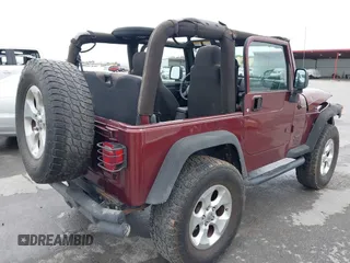 2003 Jeep Wrangler Sport with VIN 1J4FA49S63P324904, listed as a IAAI auction lot 42138001 with 170,917 mi miles and . Bid and sale history available at DreamBid. Image 4.