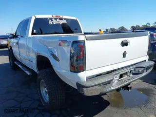 2000 GMC Sierra 1500 SLT with VIN 1GTEC19T7YZ241853, listed as a IAAI auction lot 41657692 with 166,517 mi miles. Bid and sale history available at carsss.com. Image 3.