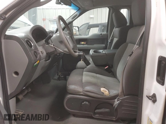 2006 Ford F-150 XL with VIN 1FTRF14596NA66799, listed as a Copart auction lot 47409015 with 303,447 mi miles and Clean Title. Bid and sale history available at carsss.com. Image 7.