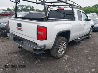 2015 GMC Sierra 1500 SLE z VIN 1GTR1UEH0FZ358519, wystawiony jako IAAI lot #42212768 z przebiegiem 144 324 mil mil oraz . Historia ofert i sprzedaży dostępna na DreamBid. Obrazek 4.