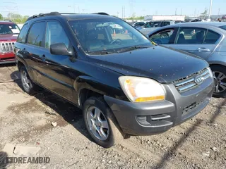 2007 Kia Sportage LX with VIN KNDJF724677447512, listed as a IAAI auction lot 42111228 with 126,732 mi miles. Bid and sale history available at carsss.com. Image 1.