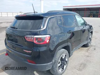 2017 Jeep Compass Trailhawk z VIN 3C4NJDDB6HT631047, wystawiony jako IAAI lot #42457508 z przebiegiem 59 414 mil mil oraz . Historia ofert i sprzedaży dostępna na DreamBid. Obrazek 4.