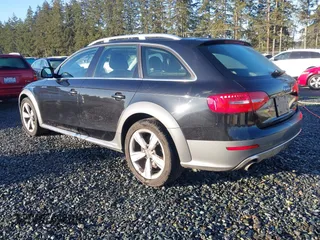2014 Audi allroad Premium Plus with VIN WA1UFAFL1EA156213, listed as a IAAI auction lot 41610274 with 115,688 mi miles. Bid and sale history available at carsss.com. Image 3.