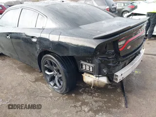 2020 Dodge Charger SXT with VIN 2C3CDXBG0LH237970, listed as a IAAI auction lot 41088945 with 106,674 mi miles and . Bid and sale history available at DreamBid. Image 6.