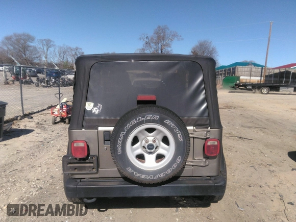 2003 Jeep Wrangler Sport with VIN 1J4FA49S53P365363, listed as a IAAI auction lot 41818320 with 154,567 mi miles. Bid and sale history available at carsss.com. Image 16.