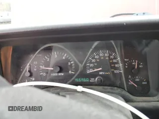 2000 Jeep Cherokee z VIN 1J4FF48S0YL254270, wystawiony jako Copart lot #52589415 z przebiegiem 166 860 mil mil oraz Szkoda całkowita • Salvage title. Historia ofert i sprzedaży dostępna na DreamBid. Obrazek 9.