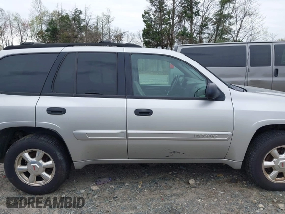 2004 GMC Envoy SLE with VIN 1GKDS13S142202004, listed as a IAAI auction lot 41921818 with 231,912 mi miles and . Bid and sale history available at DreamBid. Image 13.