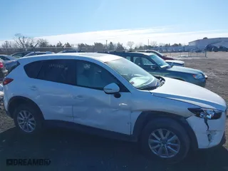 2016 Mazda CX-5 Touring with VIN JM3KE4CYXG0917841, listed as a IAAI auction lot 41420641 with 75,710 mi miles. Bid and sale history available at carsss.com. Image 13.