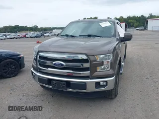 2015 Ford F-150 XLT with VIN 1FTEW1EP1FFC72160, listed as a IAAI auction lot 40351662 with 142,647 mi miles. Bid and sale history available at carsss.com. Image 12.