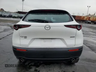 2023 Mazda CX-30 S with VIN 3MVDMBAM4PM522056, listed as a Copart auction lot 49122975 with 16,624 mi miles and Salvage title. Bid and sale history available at DreamBid. Image 6.