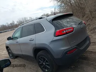 2016 Jeep Cherokee Latitude with VIN 1C4PJMCB7GW252724, listed as a IAAI auction lot 41869060 with 125,119 mi miles. Bid and sale history available at carsss.com. Image 14.