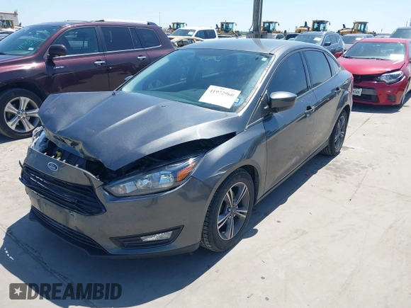 2018 Ford Focus SE with VIN 1FADP3FE3JL204220, listed as a IAAI auction lot 41972960 with 62,682 mi miles and . Bid and sale history available at DreamBid. Image 2.