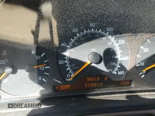 1998 Mercedes-Benz E 320 with VIN WDBJF25F3WA578364, listed as a Copart auction lot 77551834 with 228,913 mi miles and Salvage Title. Bid and sale history available at DreamBid. Image 9.