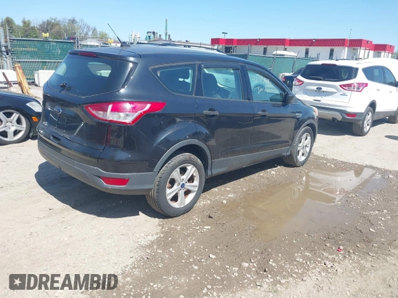 2015 Ford Escape S with VIN 1FMCU0F77FUA59064, listed as a IAAI auction lot 42073045 with 110,405 mi miles and . Bid and sale history available at DreamBid. Image 4.