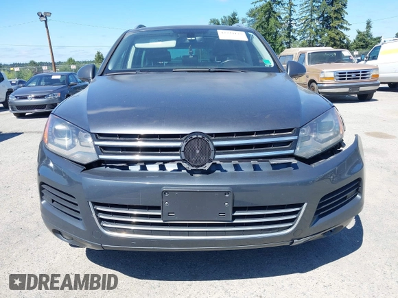 2012 Volkswagen Touareg Sport with VIN WVGFK9BP0CD004951, listed as a IAAI auction lot 42724125 with 173,993 mi miles and . Bid and sale history available at DreamBid. Image 12.
