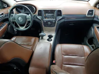 2015 Jeep Grand Cherokee Summit with VIN 1C4RJFJM7FC227296, listed as a Copart auction lot 76592514 with 144,095 mi miles and Salvage Title. Bid and sale history available at carsss.com. Image 8.