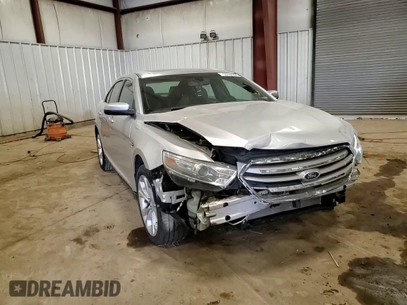 2013 Ford Taurus SEL z VIN 1FAHP2E82DG174647, wystawiony jako Copart lot #53784995 z przebiegiem Nie podano mil oraz Szkoda całkowita • Salvage title. Historia ofert i sprzedaży dostępna na DreamBid. Obrazek 13.