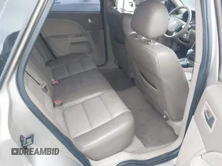 2005 Mercury Montego Luxury z VIN 1MEFM40185G611793, wystawiony jako IAAI lot #41125667 z przebiegiem Nie podano mil oraz . Historia ofert i sprzedaży dostępna na DreamBid. Obrazek 8.