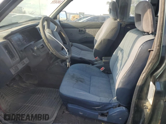 1993 Nissan Frontier SE z VIN 1N6HD16Y9PC398809, wystawiony jako Copart lot #70628754 z przebiegiem 224 511 mil mil oraz Szkoda całkowita • Salvage title. Historia ofert i sprzedaży dostępna na DreamBid. Obrazek 7.
