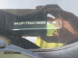 2018 Ford EcoSport SE z VIN MAJ3P1TE8JC166584, wystawiony jako IAAI lot #41674770 z przebiegiem 98 603 mil mil oraz . Historia ofert i sprzedaży dostępna na DreamBid. Obrazek 9.