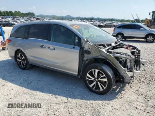 2018 Honda Odyssey Elite with VIN 5FNRL6H94JB010442, listed as a Copart auction lot 62077815 with 118,058 mi miles and Salvage title. Bid and sale history available at DreamBid. Image 4.