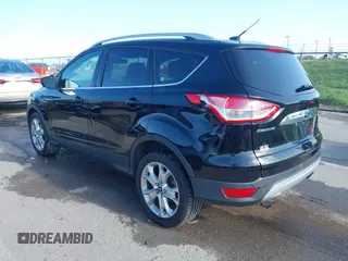 2016 Ford Escape Titanium with VIN 1FMCU9J97GUC21242, listed as a IAAI auction lot 42431567 with 96,946 mi miles and . Bid and sale history available at DreamBid. Image 3.