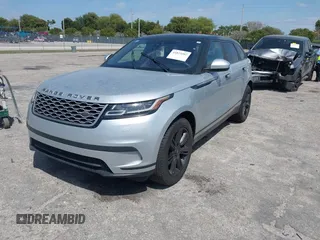 2020 Land Rover Range Rover Velar S z VIN SALYB2EXXLA255258, wystawiony jako IAAI lot #41823002 z przebiegiem 66 527 mil mil oraz . Historia ofert i sprzedaży dostępna na DreamBid. Obrazek 2.