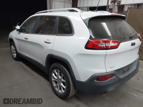 2016 Jeep Cherokee Altitude with VIN 1C4PJLCB7GW342904, listed as a IAAI auction lot 42281323 with 124,309 mi miles and . Bid and sale history available at DreamBid. Image 3.
