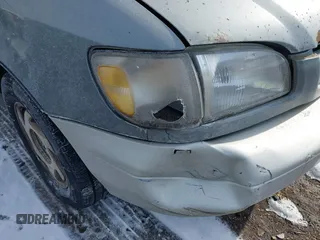 1999 Toyota Sienna LE with VIN 4T3ZF13C2XU118641, listed as a IAAI auction lot 41602097 with 261,792 mi miles. Bid and sale history available at carsss.com. Image 6.