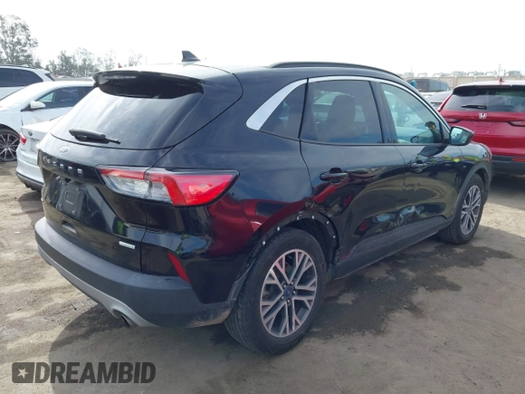 2020 Ford Escape SEL with VIN 1FMCU0H6XLUB69588, listed as a IAAI auction lot 41894196 with 79,314 mi miles and . Bid and sale history available at carsss.com. Image 4.