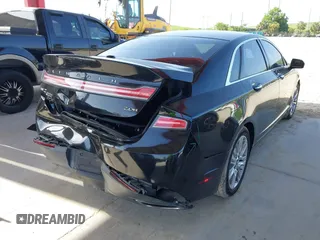 2014 Lincoln MKZ Hybrid z VIN 3LN6L2LU5ER831041, wystawiony jako IAAI lot #42447895 z przebiegiem 92 102 mil mil oraz . Historia ofert i sprzedaży dostępna na DreamBid. Obrazek 4.
