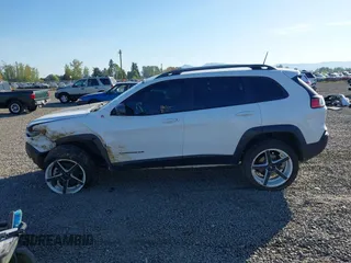 2021 Jeep Cherokee Trailhawk with VIN 1C4PJMBX9MD105888, listed as a IAAI auction lot 42065175 with 55,469 mi miles and . Bid and sale history available at DreamBid. Image 15.