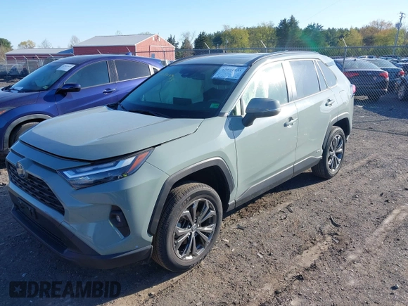 2023 Toyota RAV4 Hybrid XLE Premium with VIN JTMB6RFV3PD116696, listed as a IAAI auction lot 42044933 with 18,553 mi miles. Bid and sale history available at carsss.com. Image 2.