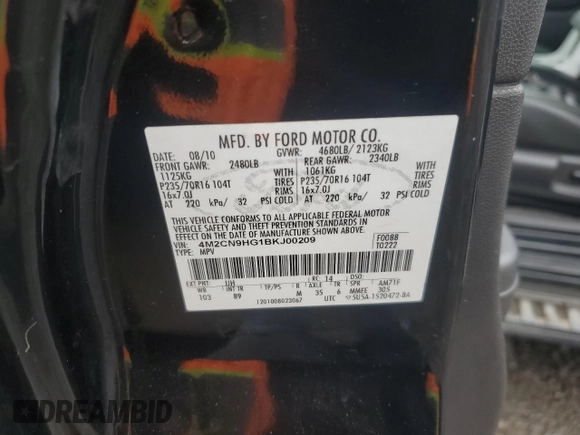 2011 Mercury Mariner Premier z VIN 4M2CN9HG1BKJ00209, wystawiony jako Copart lot #57016475 z przebiegiem 224 019 mil mil oraz Szkoda całkowita • Salvage title. Historia ofert i sprzedaży dostępna na DreamBid. Obrazek 13.