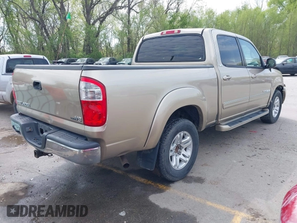 2004 Toyota Tundra SR5 with VIN 5TBET34154S453236, listed as a IAAI auction lot 42034322 with 209,028 mi miles and . Bid and sale history available at carsss.com. Image 4.