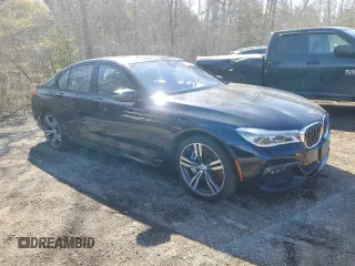 2017 BMW 7 Series 750i xDrive with VIN WBA7B0C55HG527032, listed as a Copart auction lot 52026415 with 67,722 mi miles and Clean title. Bid and sale history available at DreamBid. Image 4.