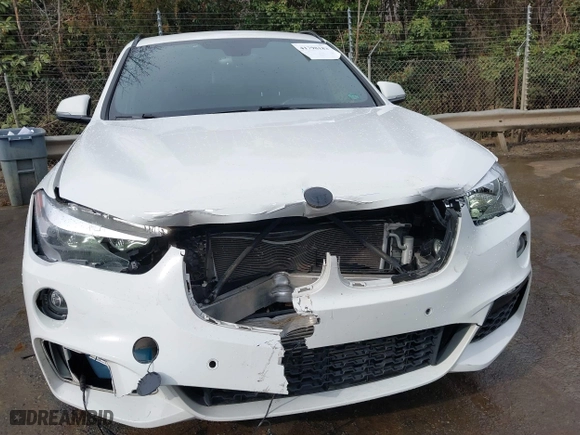 2018 BMW X1 sDrive28i with VIN WBXHU7C39J3H43185, listed as a IAAI auction lot 41798183 with 51,666 mi miles. Bid and sale history available at carsss.com. Image 6.
