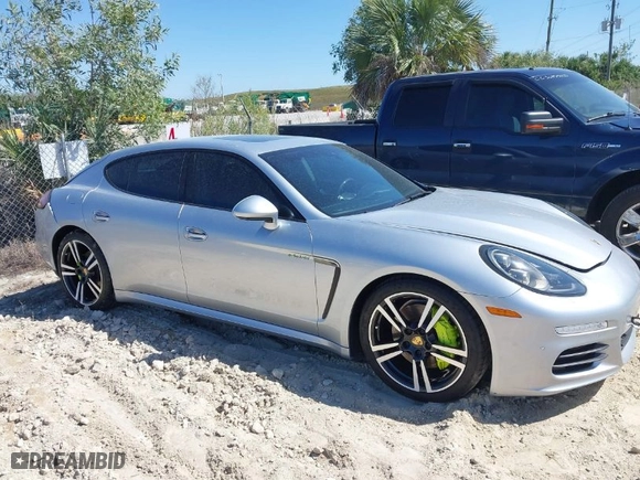 2014 Porsche Panamera S E-Hybrid with VIN WP0AD2A75EL044663, listed as a IAAI auction lot 41818381 with 44,194 mi miles. Bid and sale history available at carsss.com. Image 13.
