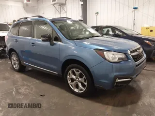 2018 Subaru Forester Touring z VIN JF2SJAWC3JH498700, wystawiony jako IAAI lot #42170290 z przebiegiem 60 497 mil mil oraz . Historia ofert i sprzedaży dostępna na DreamBid. Obrazek 1.