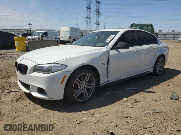 2013 BMW 5 Series 550i xDrive with VIN WBAFU9C52DDY71651, listed as a Copart auction lot 52156465 with 144,211 mi miles and Salvage title. Bid and sale history available at DreamBid. Image 1.