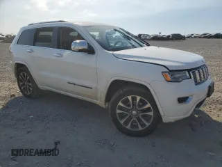 2017 Jeep Grand Cherokee Overland with VIN 1C4RJFCG9HC633011, listed as a Copart auction lot 48596125 with 0 mi miles and Salvage Title. Bid and sale history available at carsss.com. Image 4.